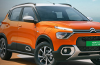 Carmakers in race for low-cost EVs amid tepid sales growth